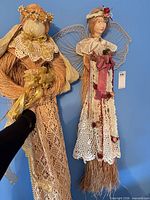 Both angels side by side showing overall construction and scale