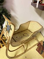 Full view of wooden sleigh on runners