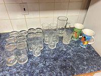 All twenty drinkware pieces grouped on counter