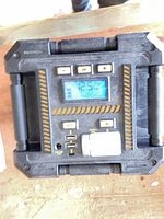 Top view of CAT power station showing LCD, control buttons, USB and AC ports