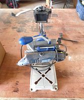 Front view of rotary tool mounted on stand