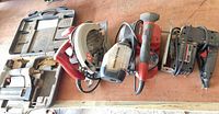All five Craftsman tools lined up with case
