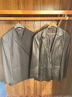 Front view of both jackets hanging