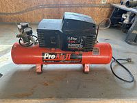 Full left-side view showing tank, motor, brand label