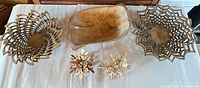 Full lot showing dough bowl, two lattice bowls, three snowflake ornaments