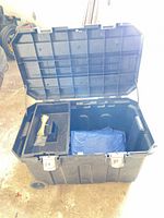 Open view of Stanley rolling toolbox showing interior tray and contents