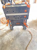workbench folded upright with clamps attached