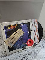 Front cover, vinyl partially visible