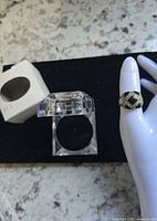 Ring on display hand showing overall design