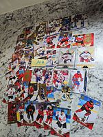 overview of the mixed NHL hockey cards spread on countertop