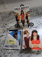 Front slipcase and partially opened inner case displayed on countertop