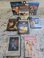 Front view of all seven movie cases for title identification