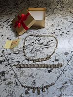 Overview of all four rhinestone pieces on counter