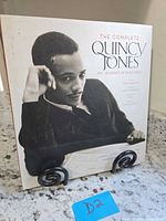 Front cover of hardcover book on stand