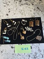 Overall view of all eight jewelry pieces on display card
