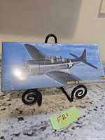 Front of sealed Hasegawa SBD-4 Dauntless kit on stand