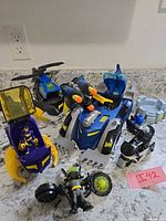 Group shot of all Batman Imaginext vehicles, figures and accessories