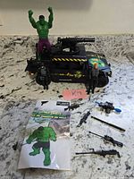 Full set showing vehicle, figures, weapons, instruction sheet