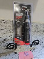 Front of sealed Benchmark 14-in-1 ratcheting screwdriver set