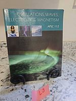 Front cover of Queen's University APSC 112 textbook
