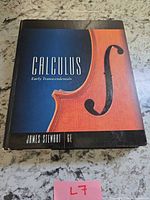 Front cover showing title, author James Stewart, 6e designation