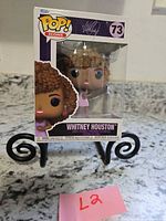 Front view of boxed Whitney Houston Pop! Icons vinyl figure #73