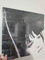 Front cover sealed in shrink showing artwork