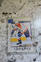 Front of autographed Dave Gagner Be A Player card in plastic case