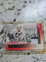 Front of card showing player image, patch swatch, branding