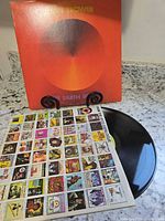 Front outer sleeve, vinyl record, printed inner sleeve