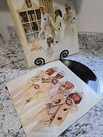 Front cover with vinyl and printed inner sleeve