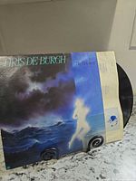 Front cover with vinyl partially visible