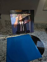 Front cover, vinyl, blue inner sleeve