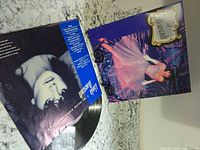 Front cover showing Linda Ronstadt in pink gown alongside visible vinyl and inner sleeve