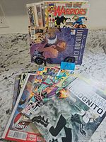 Front view showing all comic book covers in lot