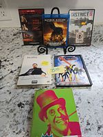 Front view of six packaged titles