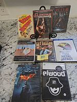 Front view of eight DVD cases showing cover art