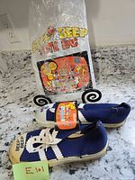 Shoes with tag and tote bag overview