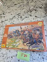 Front of box showing artwork and branding