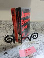 Side view showing spine and shrink wrap