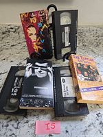 Overview of all three VHS tapes and cases