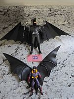 Both Batman figures with wings displayed