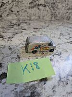 Left side view showing Superman graphic