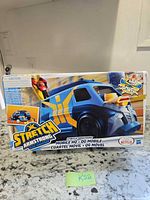 Front of sealed Stretch Armstrong Mobile HQ box