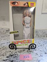 Front view of boxed Ginger Spice doll