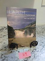 Front cover of textbook showing title and authors