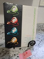 Front cover of Modern Graphics Communication textbook