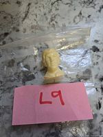 Front view of Bobby Orr plastic head bust in bag