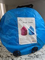 Carry bag showing product label with images of tent