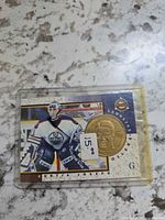 Front view showing player image, coin, team logo and price sticker